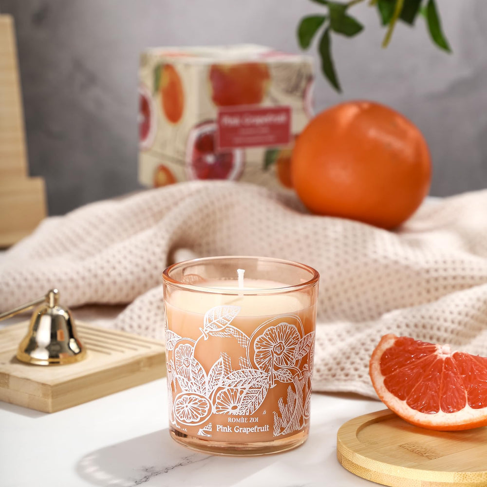 Candle with soft glow in a cozy home office setting