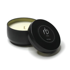 Rosbas Palo Santo candle tin top view highlighting long burn time and steady flame.