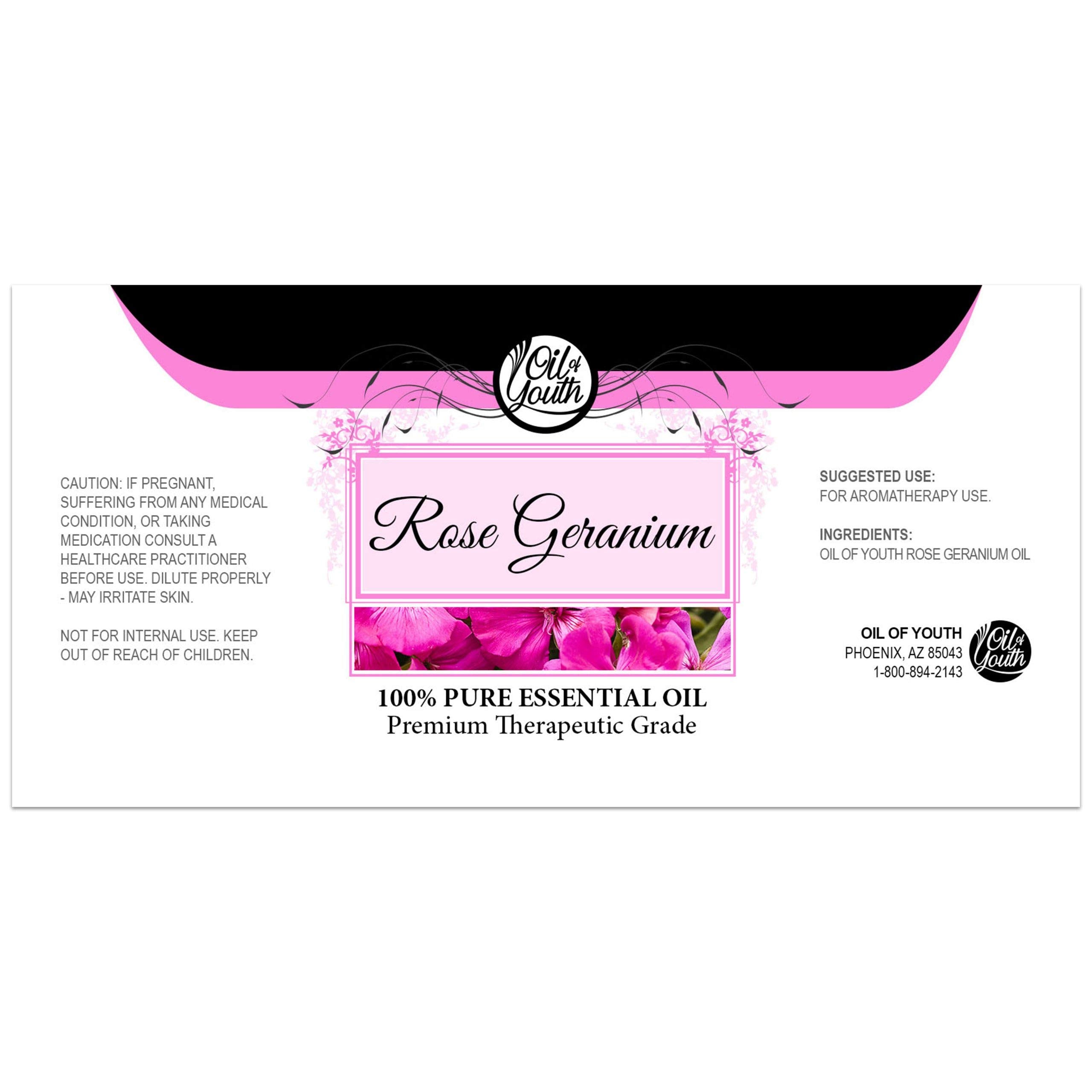 Close-up of pouring rose geranium essential oil