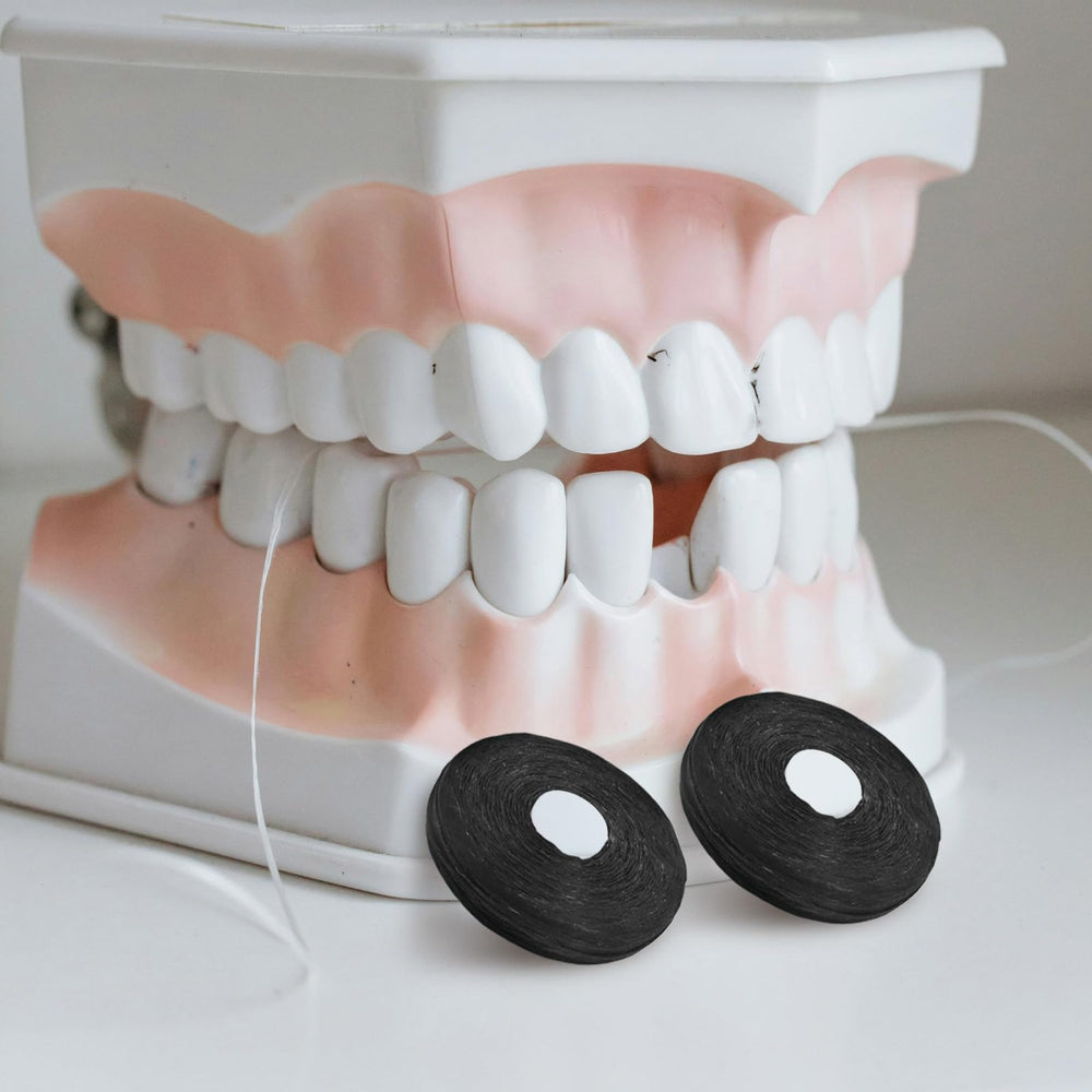 Dental floss between teeth with built-in spool wire