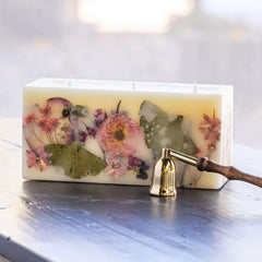 Rosy Rings Blushing Rosewood Brick candle—front view with botanical elements for luxury decor