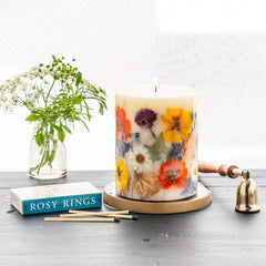 Candle burning with autumn floral fragrance