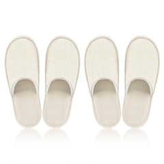 Roucerlin beige guest slippers packaged for easy hotel guest distribution.