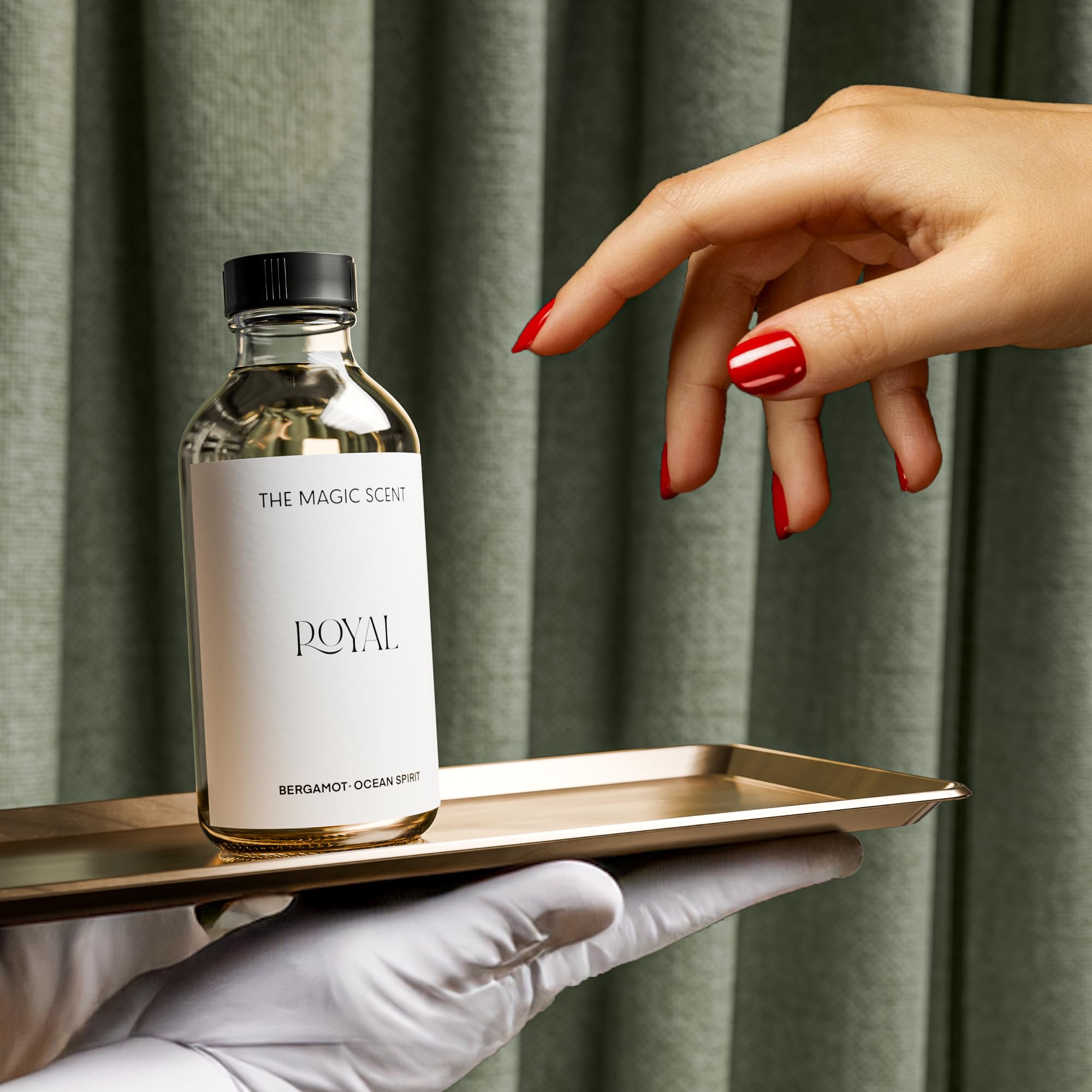 Diffuser bottle beside a diffuser device to show usage