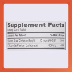 Calcium carbonate tablet close-up (600 mg)