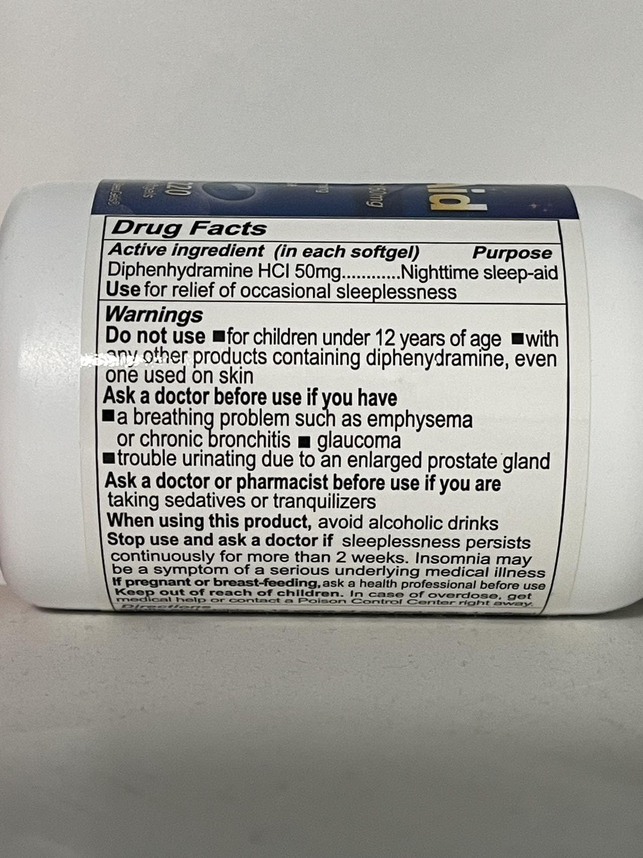 RXZELL Sleep Aid bottle on nightstand evokes calm bedtime ritual.
