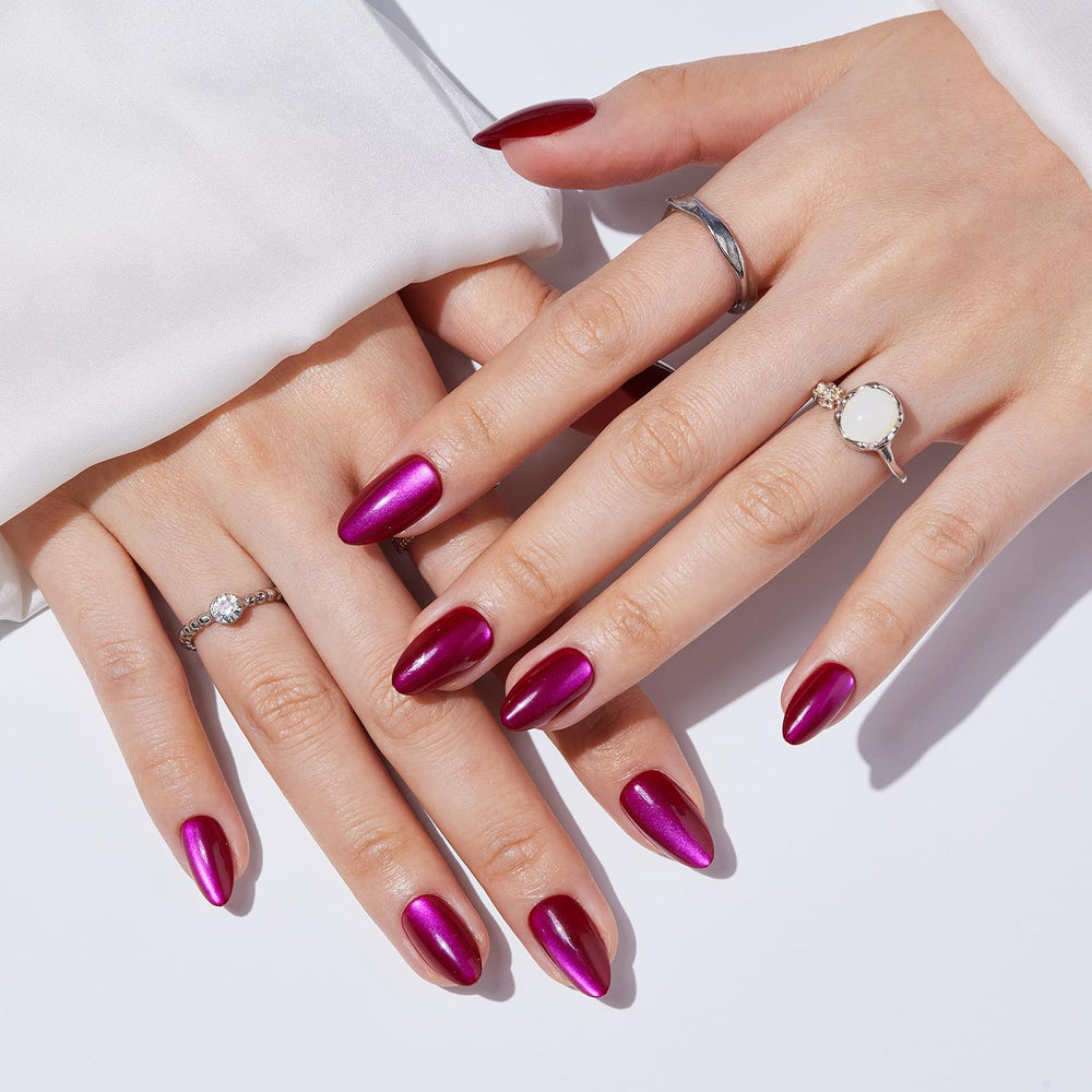 S.T. Friends almond nails in red cat eye design for effortless DIY glam