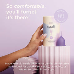 Saalt Soft Cup regular size in hand demonstrates comfortable, leak-free wear possibilities.