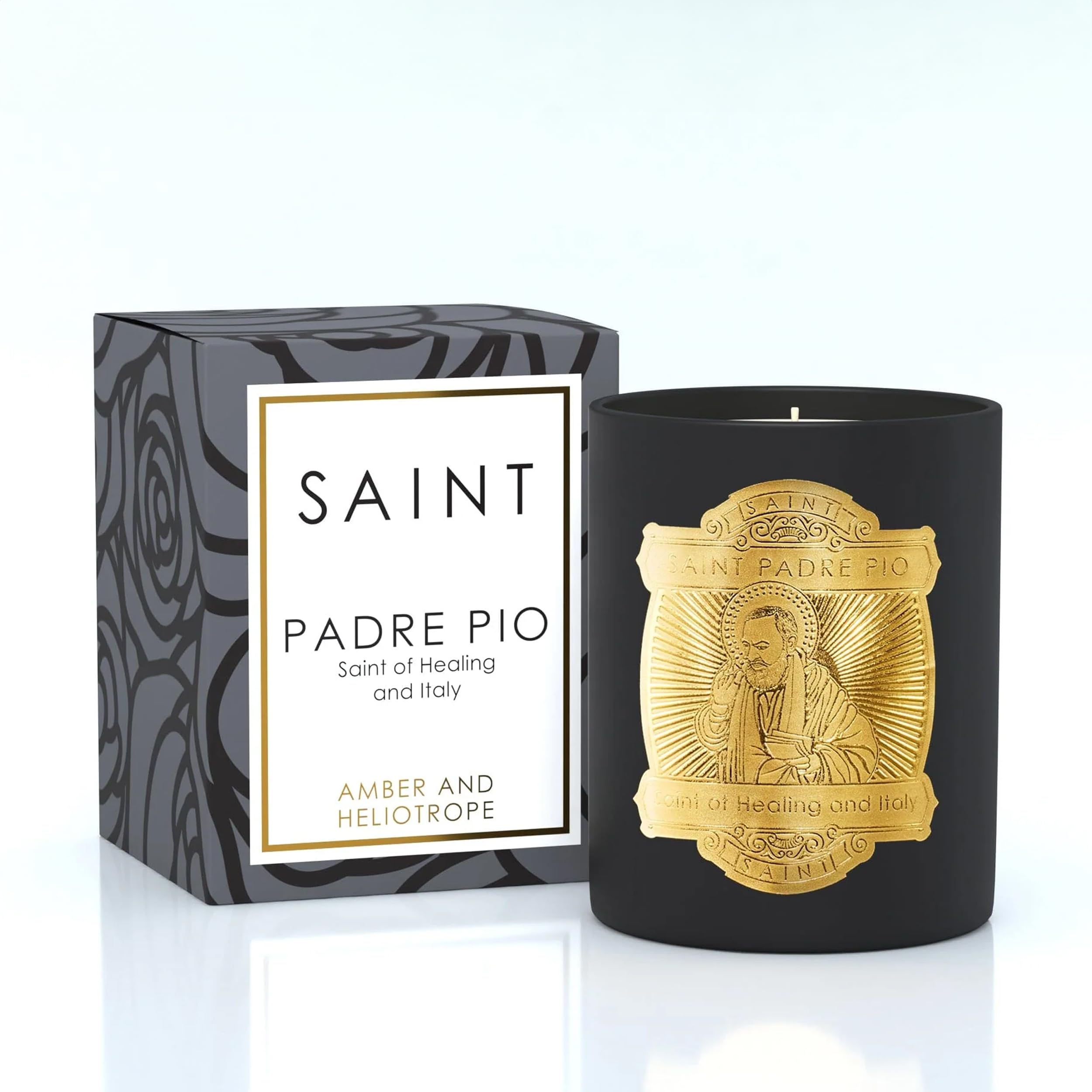 Saint Padre Pio candle with embedded Italian prayer coin