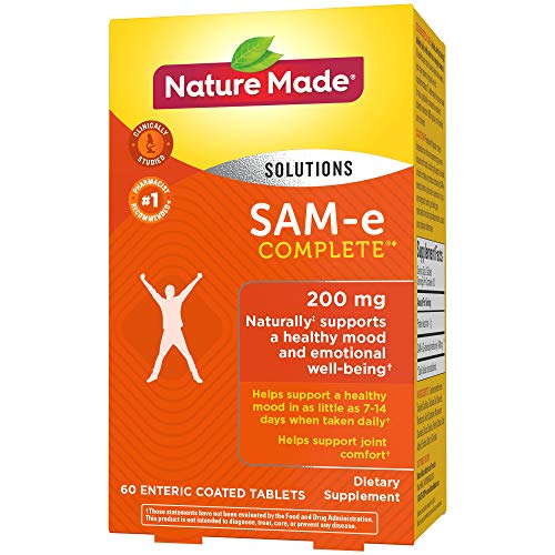 Bottle with a glass of water and SAM-e Complete tablet