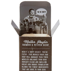 Filthy Man bar showing exfoliating bits for textured cleansing.