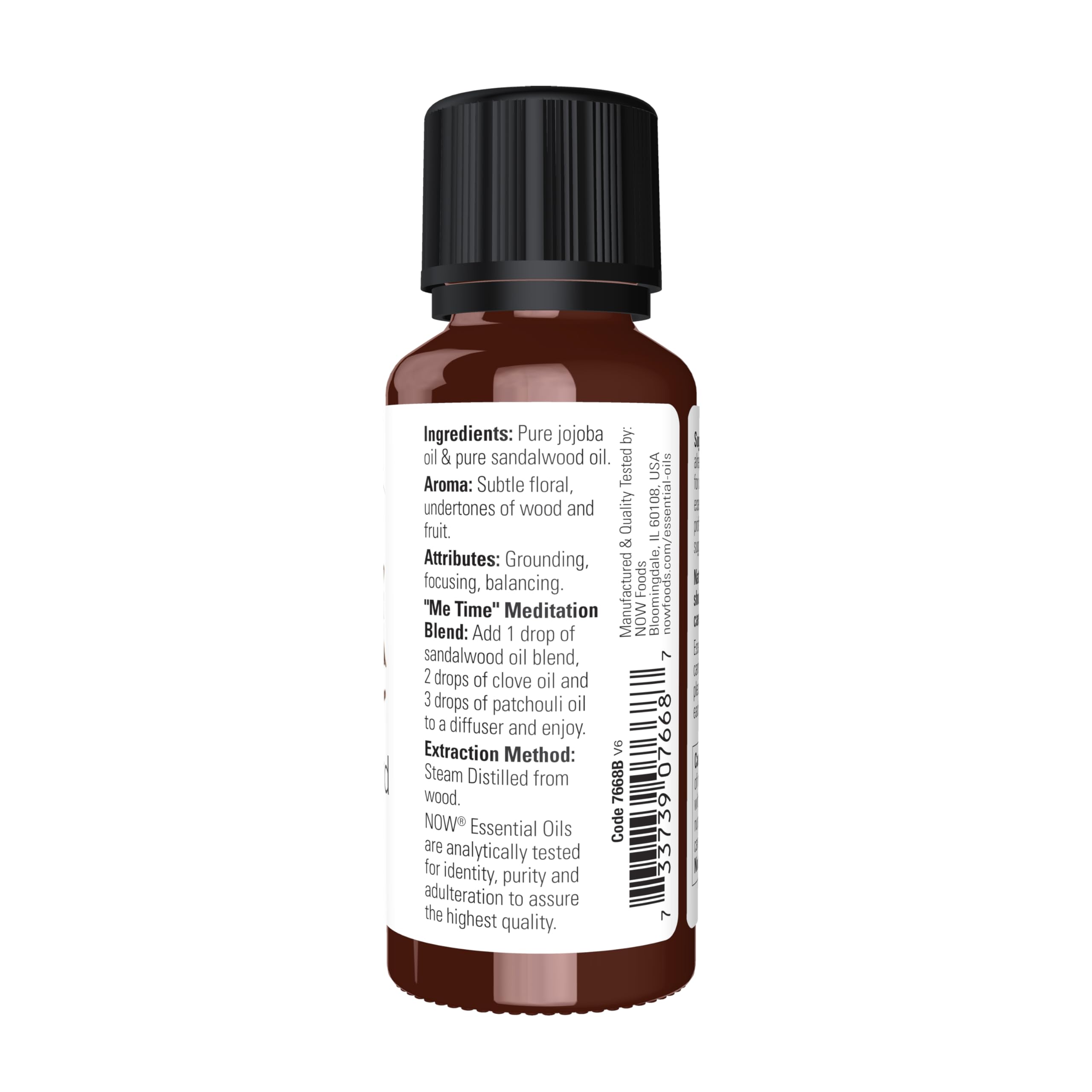 Sandalwood oil in jojoba oil bottle close-up