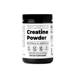 Container of Santa Cruz Paleo Creatine Monohydrate powder on a white surface