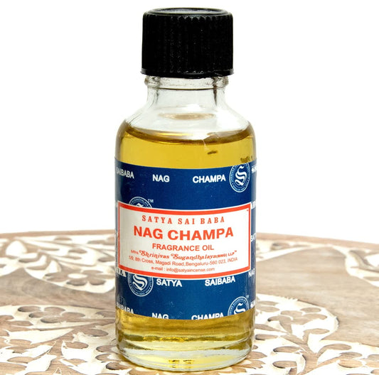 Close-up view of Nag Champa essential oil bottle label