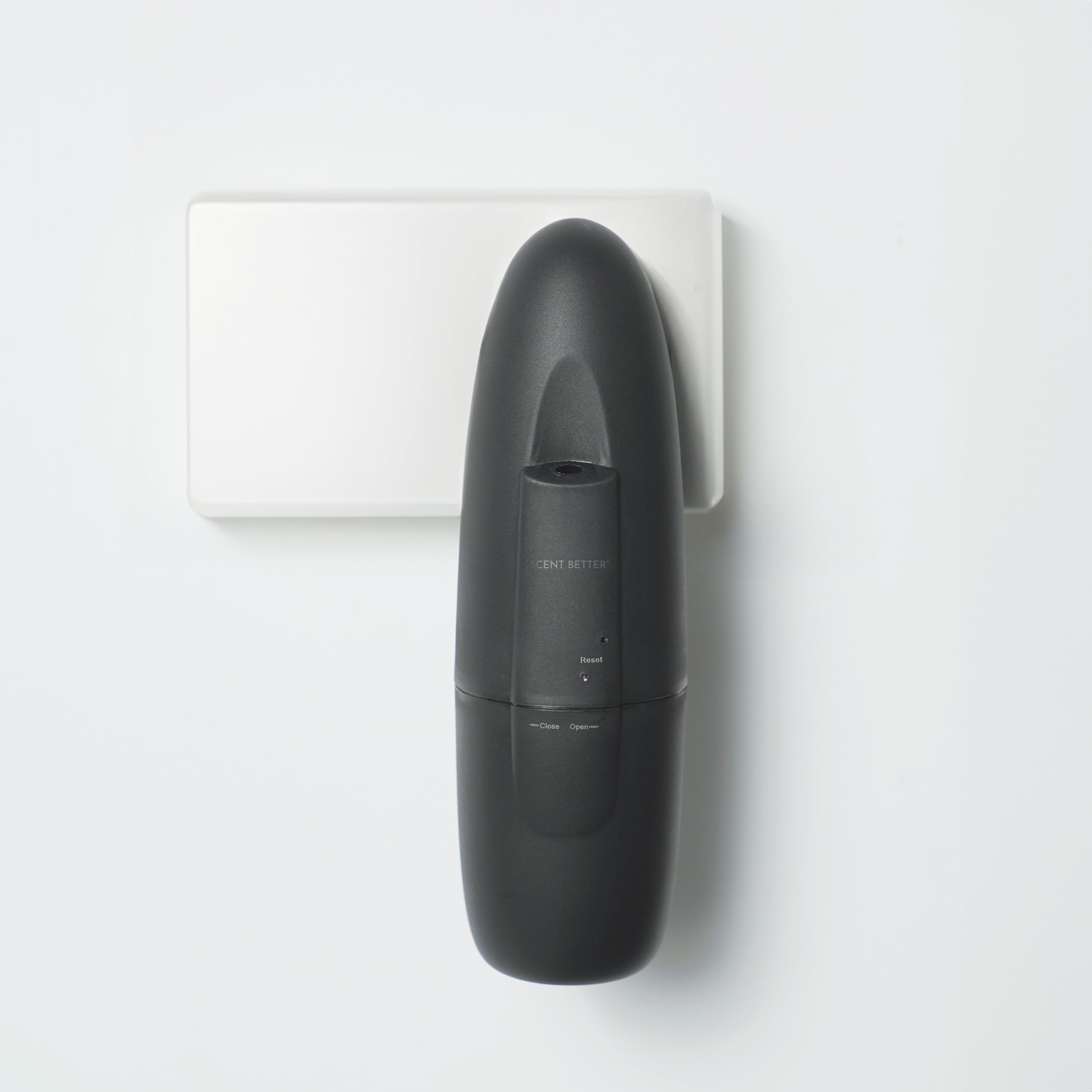Close-up of diffuser plugged into wall outlet