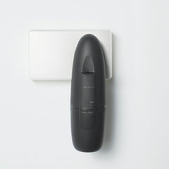 Close-up of diffuser plugged into wall outlet