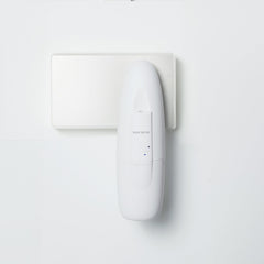 Scent Better Plug In Diffuser in white finish plugged into wall outlet