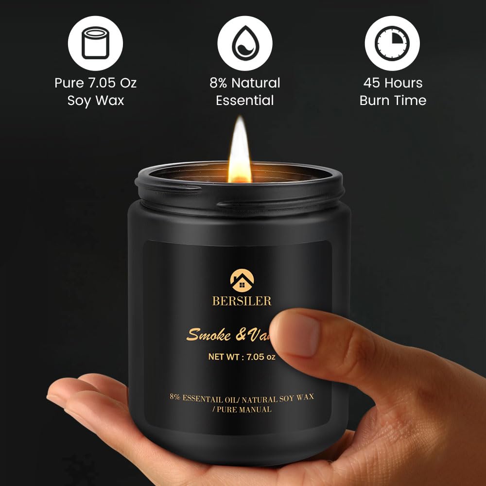 Masculine black candle on a neutral surface