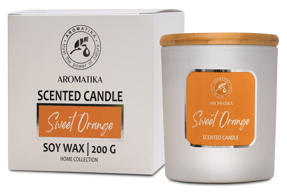 Scented Candle Sweet Orange in a clear glass jar