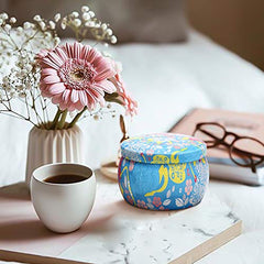 Close-up of soy wax travel tin candle