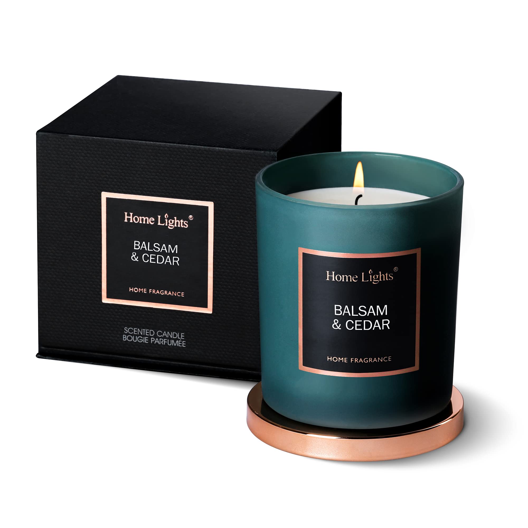 Scented soy candle in clear glass jar with balsam and cedar fragrance