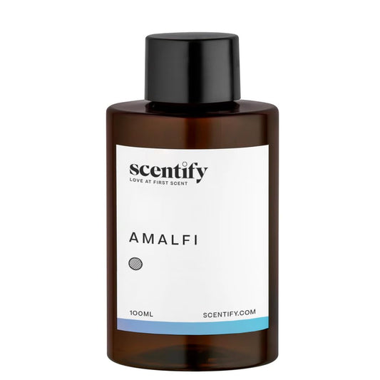 Amber diffuser oil bottle labeled Amalfi in a premium amber bottle