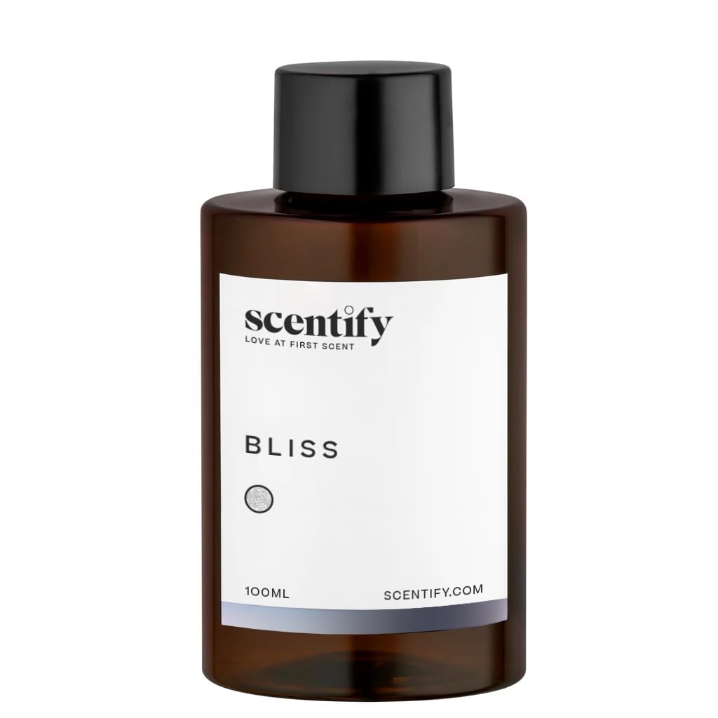 Amber glass bottle with diffuser oil and minimalist label