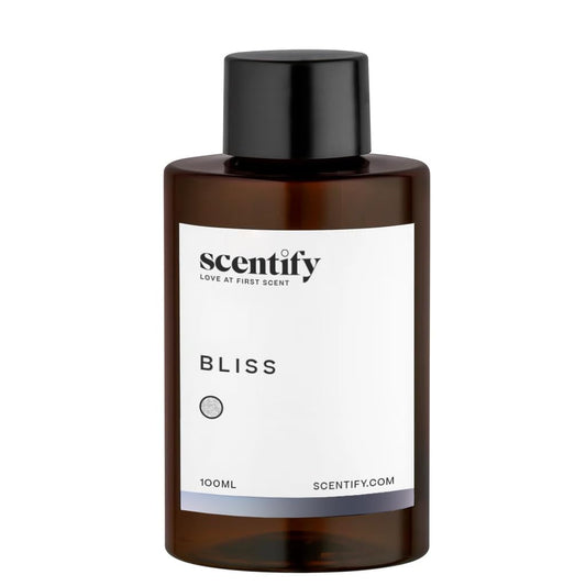 Amber glass bottle with diffuser oil and minimalist label