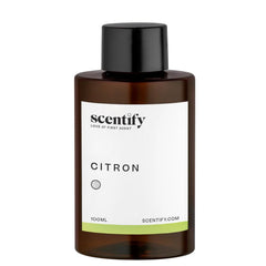 Close up of citron diffuser oil bottle with amber bottle