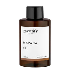 Close-up of Havana diffuser oil bottle with amber glass and label
