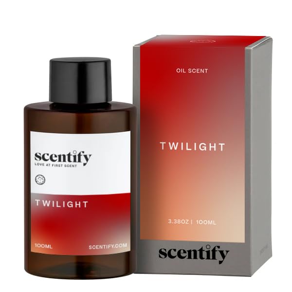 Twilight aroma oil in amber bottle with apple, spice and citrus notes