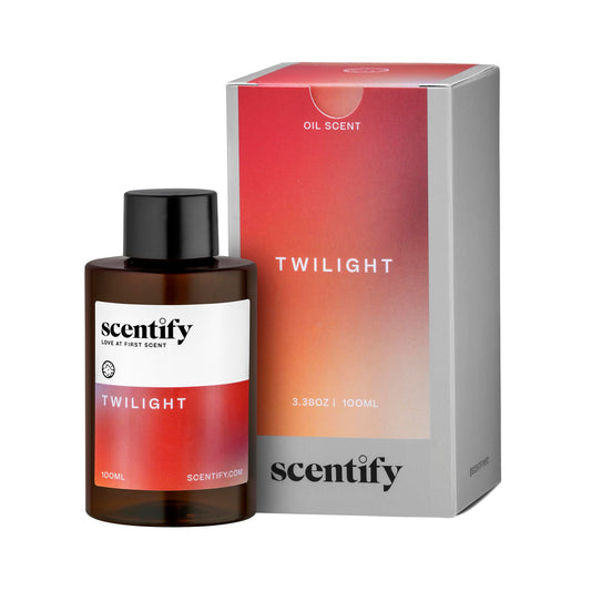 Scentify amber bottle front view showing elegant holiday diffuser refill