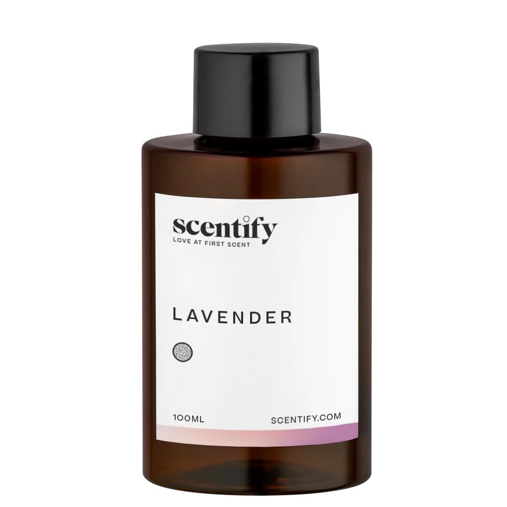 Close-up of amber diffuser oil bottle with lavender musk label