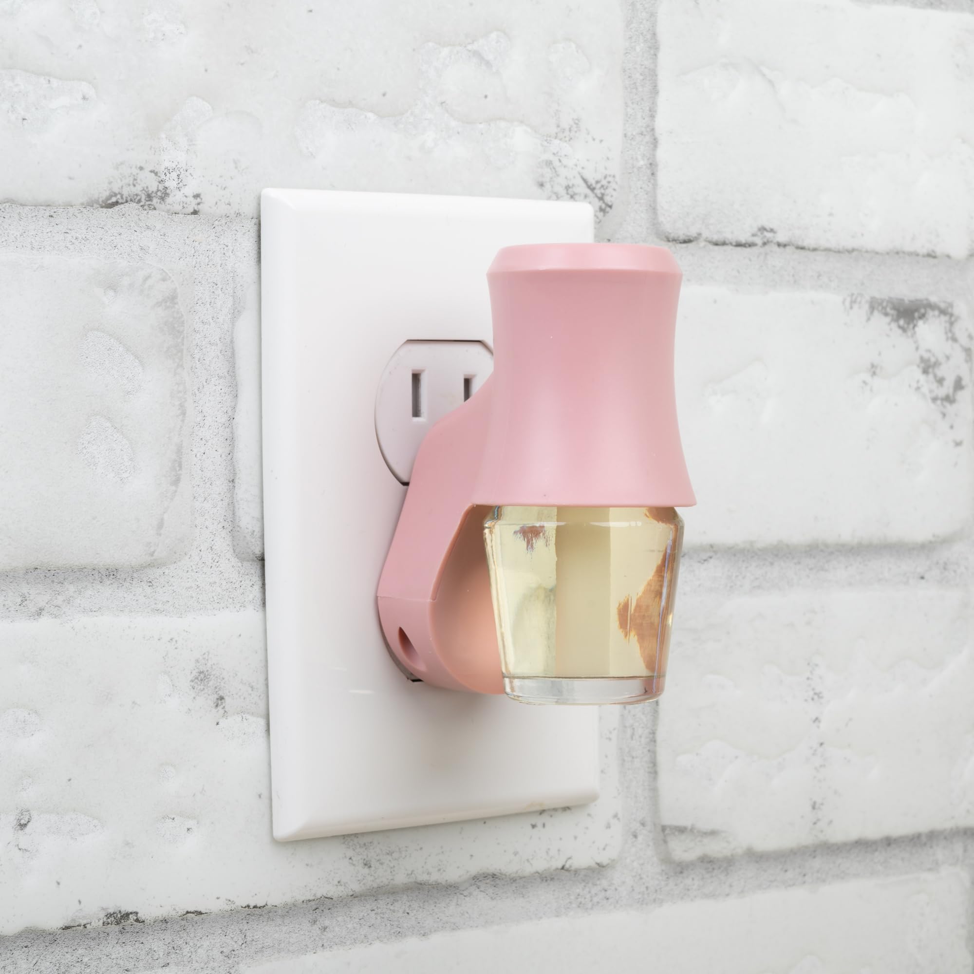 Living room setup featuring Scentsationals plug-in diffuser for continuous fragrance