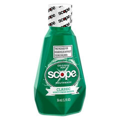 Close-up of Scope Original Mint Mouthwash bottle showing minty freshness