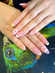 Seafish A02 almond-shaped nails with dainty pearls for a refined look