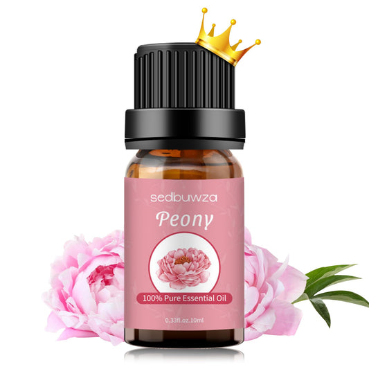 Sedbuwza Peony Essential Oil bottle on wooden surface