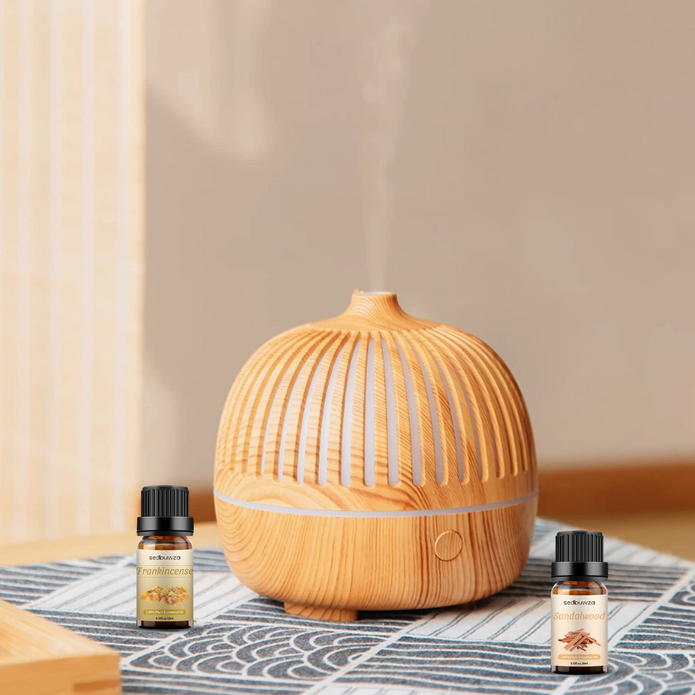 Diffuser releasing sandalwood and frankincense scents