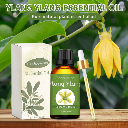 Amber bottle with dropper cap containing Ylang Ylang essential oil