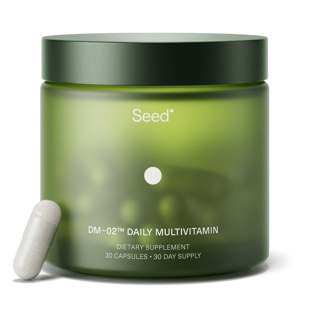 Seed DM-02 bottle closeup, convenient vegan daily multivitamin for everyday nutrition.