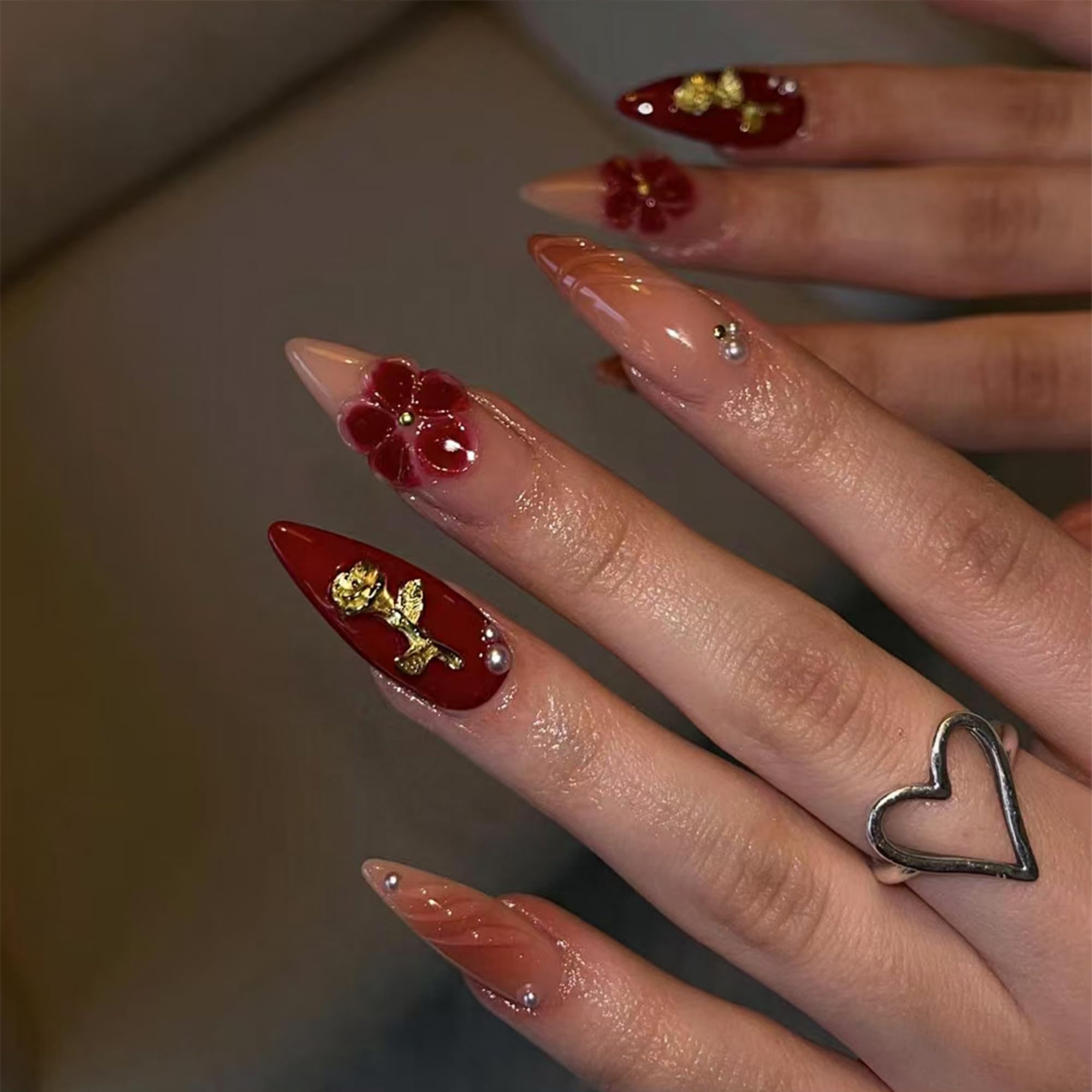 SEENEEY almond press-on nails with red gold flowers design for quick salon manicure at home.