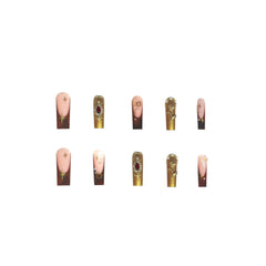 SEENEEY square false nails with red rhinestones and gold floral accents for evening wear