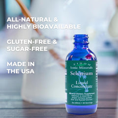 Dropper dispensing selenium liquid drops from a bottle