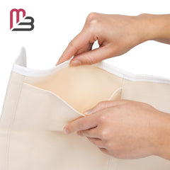 Self-care kit in use with castor oil wrap