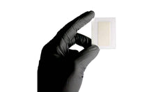 Positive result on semen detection strip showing bright purple color
