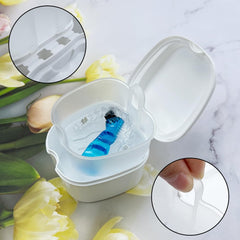 Denture storage case with versatile compartments in travel setup