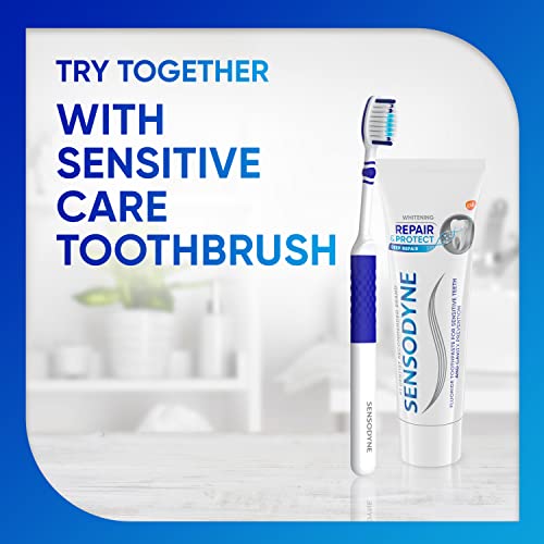 Toothpaste on vanity with dental care setup
