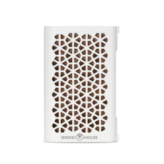 Serene House Puccini lava rock diffuser on car vent enables portable aromatherapy.