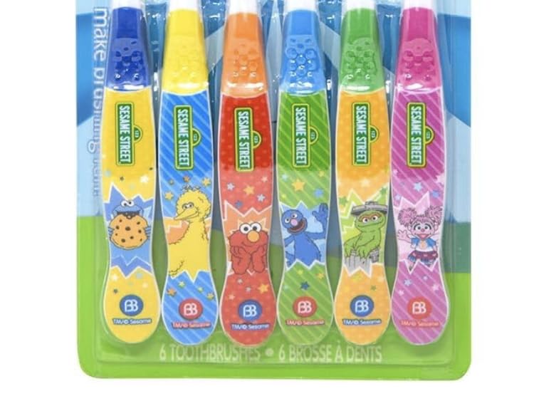 Ergonomic easy-grip handles on Sesame Street-themed kids’ toothbrushes.