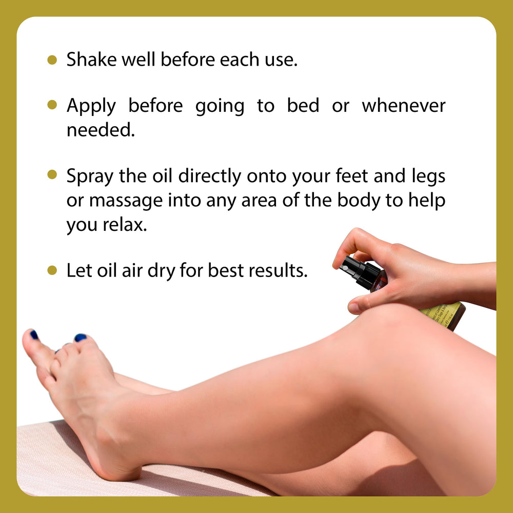 Hand applying magnesium spray onto skin